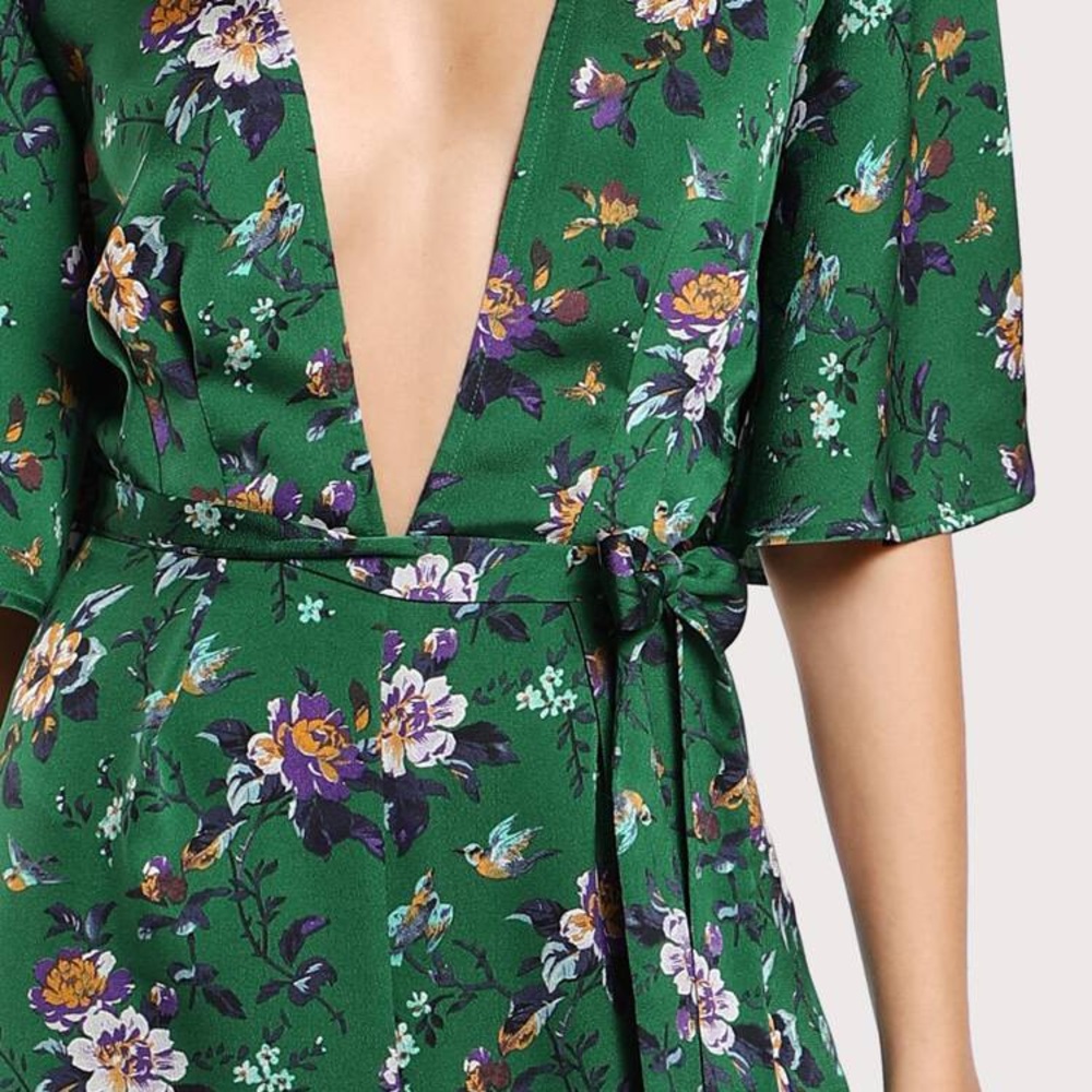 Green floral plunge neck jumpsuit with tie waist